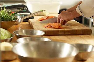 Fresh salmon being prepared