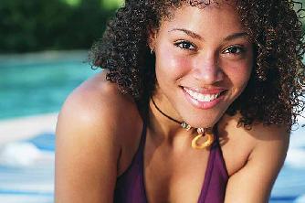 woman in swimsuit at pool
